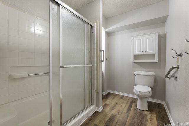 18510 Paloma Wood, San Antonio, TX 78259 - bathroom featuring an enclosed shower and wood finished floors