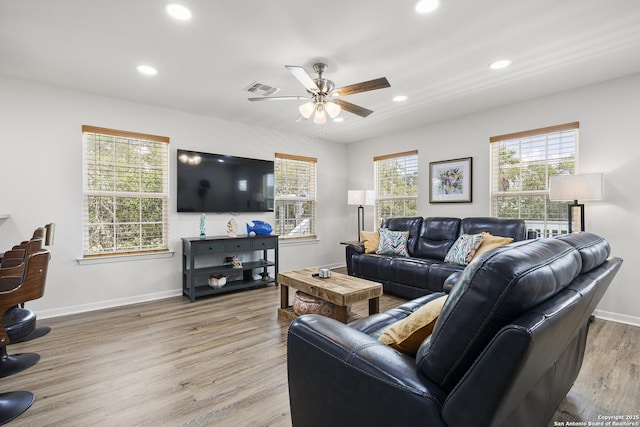 607 Huisache, Ingleside, TX 78362 - living room featuring a ceiling fan, light wood-style flooring, and recessed lighting