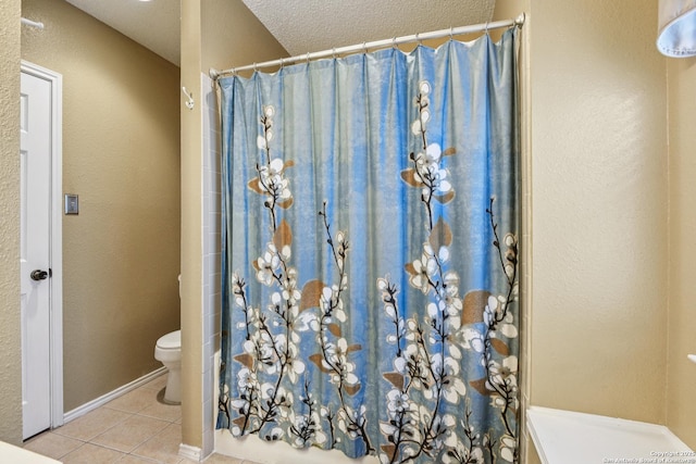 11063 Moonlit, San Antonio, TX 78249 - full bathroom with tile patterned flooring and a shower with shower curtain