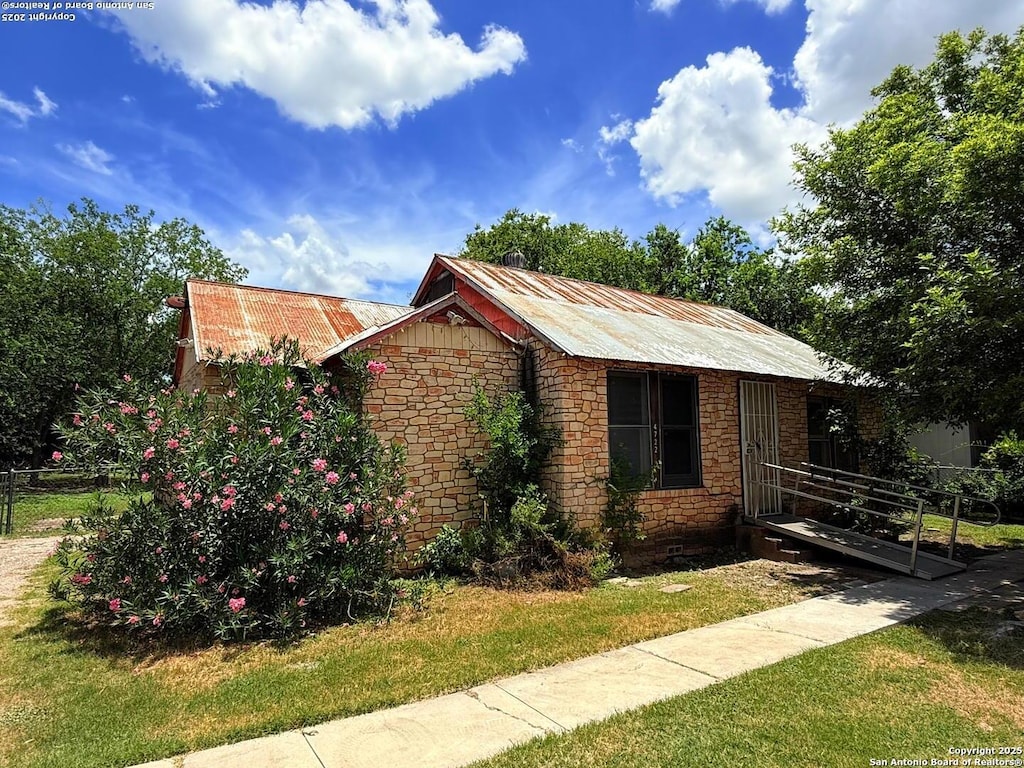 4722 Gibbs Sprawl, Kirby, TX 78219 - view of side of property with stone siding