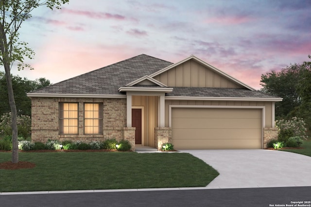 4273 Carlotta Dr, New Braunfels, TX 78130 - view of front facade featuring brick siding, concrete driveway, a garage, board and batten siding, and a lawn