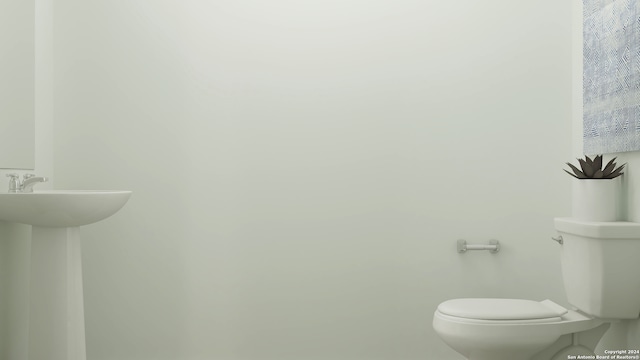 110 Speargrass Ln, Odem, TX 78370 - bathroom with toilet and a sink