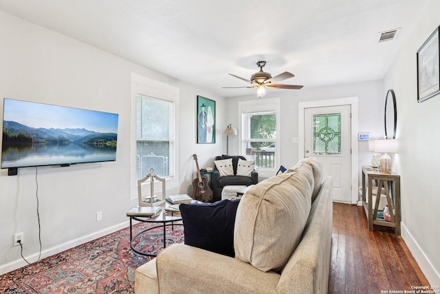 107 W Gilbert, Falls City, TX 78113 - living area with a ceiling fan and wood finished floors