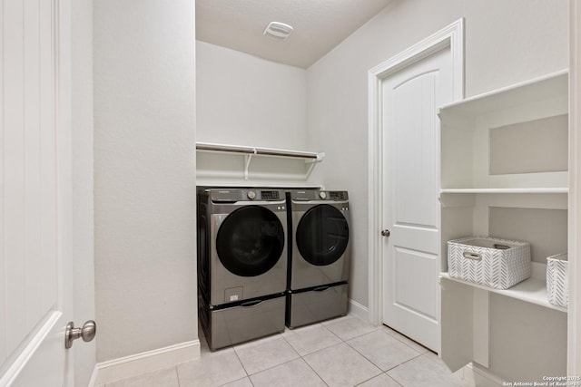 11910 Wilby, San Antonio, TX 78253 - washroom with independent washer and dryer and tile patterned floors