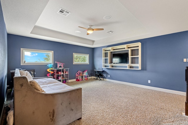 11910 Wilby, San Antonio, TX 78253 - sitting room with a tray ceiling, ceiling fan, and carpet