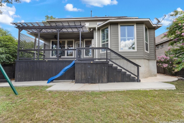 11910 Wilby, San Antonio, TX 78253 - back of house with a pergola, a playground, and stairway