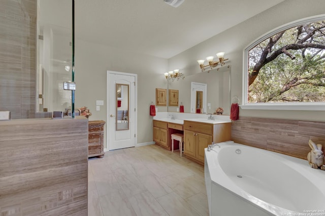 577 River Chase, New Braunfels, TX 78132 - bathroom featuring vanity and a garden tub