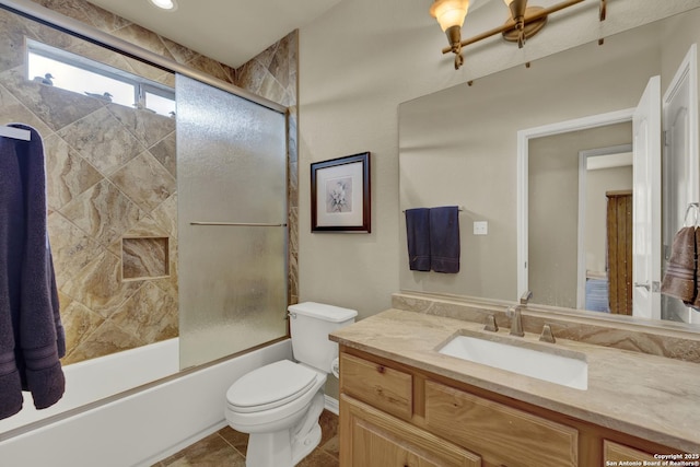 577 River Chase, New Braunfels, TX 78132 - full bath with vanity, shower / bath combination with glass door, and tile patterned flooring
