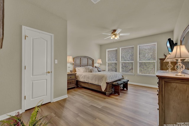 577 River Chase, New Braunfels, TX 78132 - bedroom featuring light wood-type flooring and ceiling fan