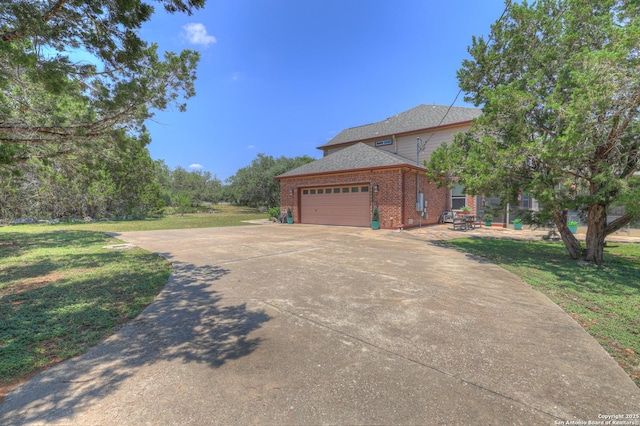 577 River Chase, New Braunfels, TX 78132 - view of property exterior featuring brick siding, concrete driveway, an attached garage, a lawn, and roof with shingles