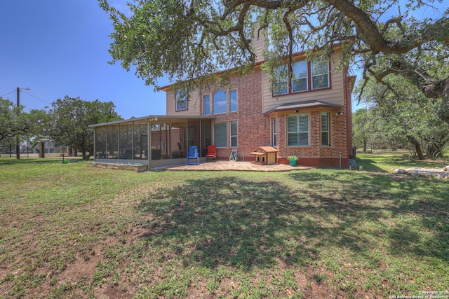 577 River Chase, New Braunfels, TX 78132 - rear view of property featuring a sunroom, brick siding, a lawn, and a chimney