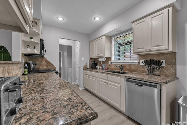 139 Navajo Cir, Cibolo, TX 78108 - kitchen with stainless steel dishwasher, electric range oven, open shelves, tasteful backsplash, and light wood-style floors