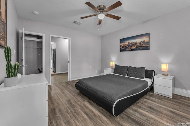 139 Navajo Cir, Cibolo, TX 78108 - bedroom featuring wood finished floors and a ceiling fan
