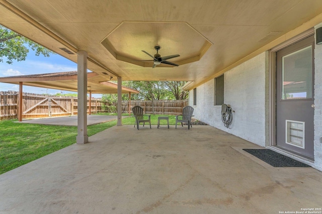 139 Navajo Cir, Cibolo, TX 78108 - fenced backyard featuring a ceiling fan and a patio area