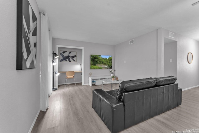 139 Navajo Cir, Cibolo, TX 78108 - living room with wood finished floors and baseboards