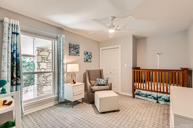 14339 Hill Prince, San Antonio, TX 78248 - bedroom featuring light carpet, a ceiling fan, and a closet