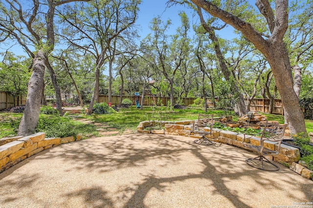 14339 Hill Prince, San Antonio, TX 78248 - fenced backyard with a patio area