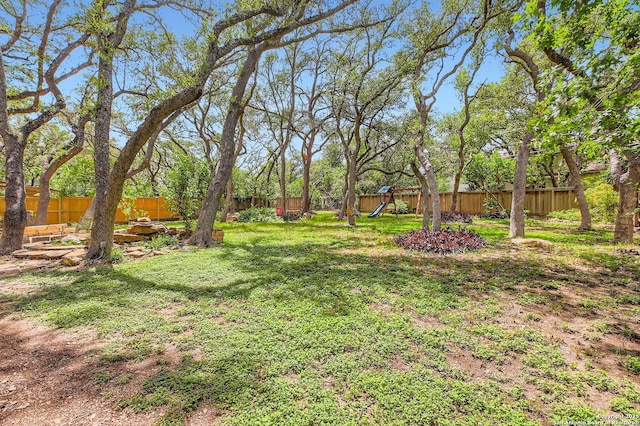 14339 Hill Prince, San Antonio, TX 78248 - fenced backyard featuring a playground