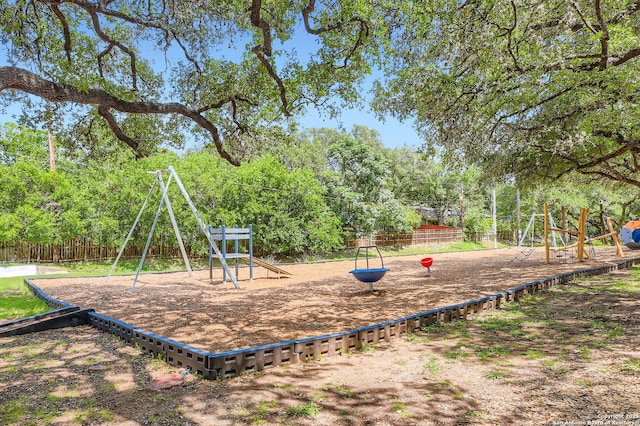 14339 Hill Prince, San Antonio, TX 78248 - community jungle gym featuring view of wooded area