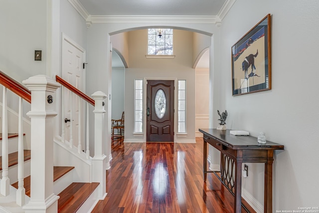 13610 Pearlstone, San Antonio, TX 78232 - entryway featuring arched walkways, wood-type flooring, crown molding, and stairway