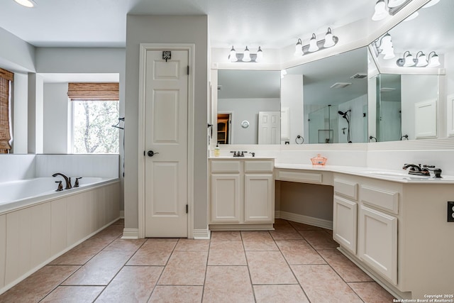 13610 Pearlstone, San Antonio, TX 78232 - bathroom with double vanity, a stall shower, a garden tub, and tile patterned flooring