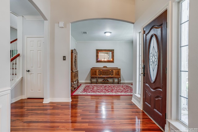 13610 Pearlstone, San Antonio, TX 78232 - entrance foyer featuring arched walkways, wood finished floors, and ornamental molding
