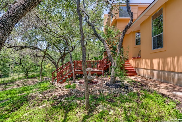 13610 Pearlstone, San Antonio, TX 78232 - view of yard featuring stairway and a wooden deck