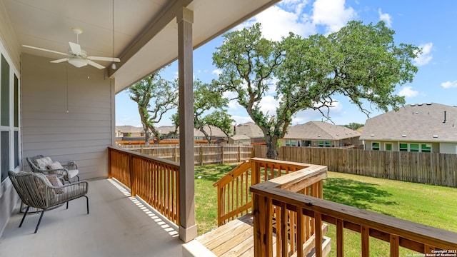 5322 Silent Dusk, Bulverde, TX 78163 - wooden deck featuring a ceiling fan, a fenced backyard, and a residential view