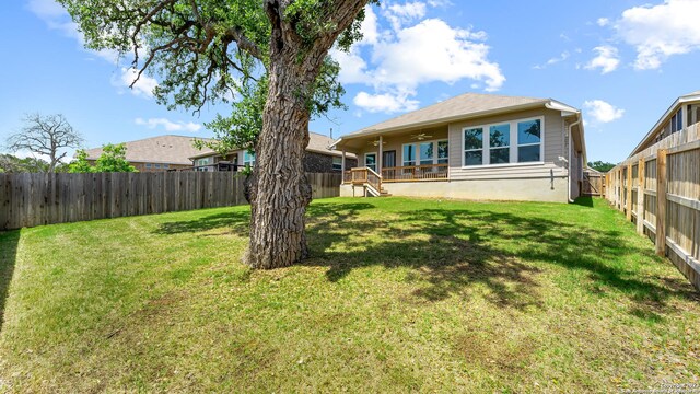 5322 Silent Dusk, Bulverde, TX 78163 - fenced backyard with a ceiling fan and stairs