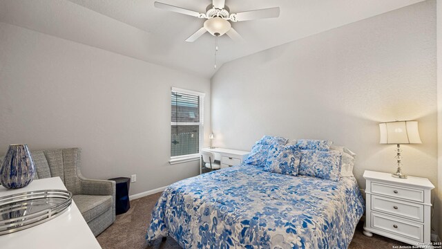 5322 Silent Dusk, Bulverde, TX 78163 - bedroom featuring dark carpet, vaulted ceiling, and ceiling fan