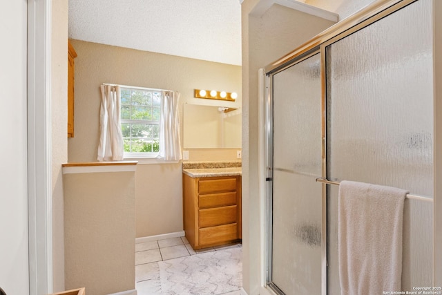 611 Wild Turkey, New Braunfels, TX 78132 - bathroom featuring vanity, a shower with door, and tile patterned floors