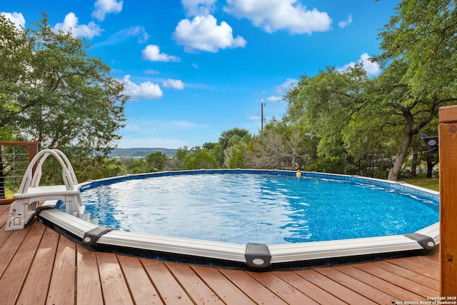 611 Wild Turkey, New Braunfels, TX 78132 - view of swimming pool with a deck