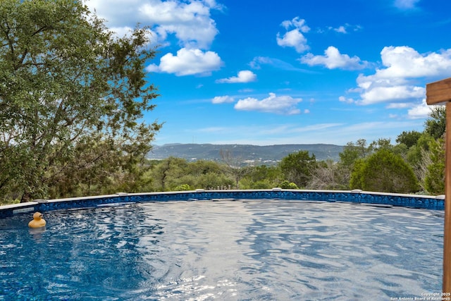 611 Wild Turkey, New Braunfels, TX 78132 - view of pool with a mountain view