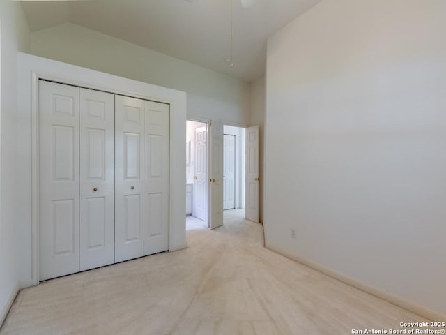 21 Greens Clf, San Antonio, TX 78216 - unfurnished bedroom with light carpet, vaulted ceiling, and a closet