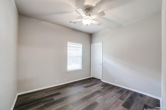 25547 Veining, San Antonio, TX 78261 - unfurnished room featuring dark wood-style flooring and a ceiling fan