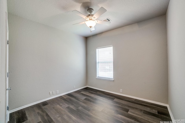 25547 Veining, San Antonio, TX 78261 - spare room featuring dark wood-type flooring and ceiling fan
