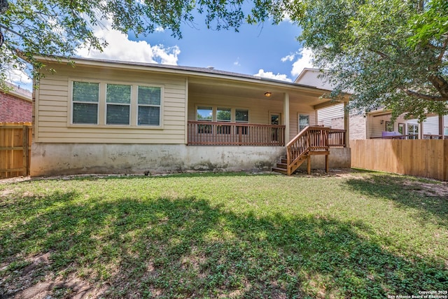 25547 Veining, San Antonio, TX 78261 - rear view of house featuring a fenced backyard and stairs