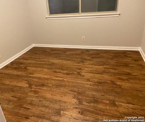 8602 Wood Peak, San Antonio, TX 78251 - spare room with dark wood-type flooring