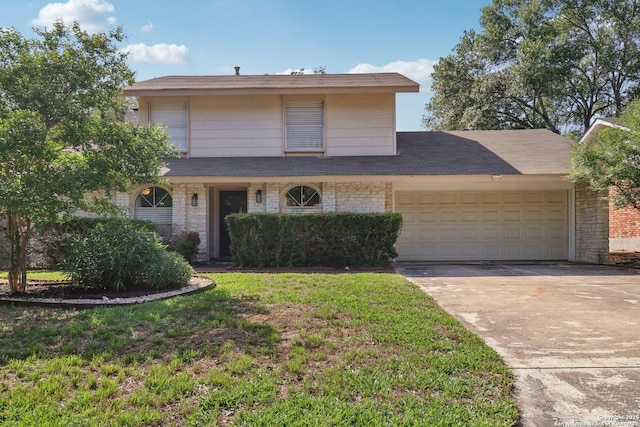 1710 Searcy, San Antonio, TX 78232 - traditional-style home with an attached garage, concrete driveway, and a front lawn