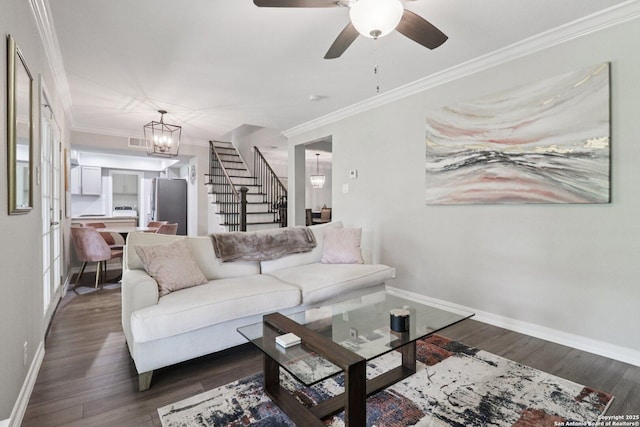 1710 Searcy, San Antonio, TX 78232 - living room with stairway, ornamental molding, a chandelier, wood finished floors, and ceiling fan