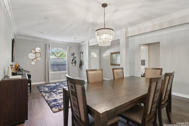 1710 Searcy, San Antonio, TX 78232 - dining area featuring a chandelier, dark wood-style flooring, and ornamental molding