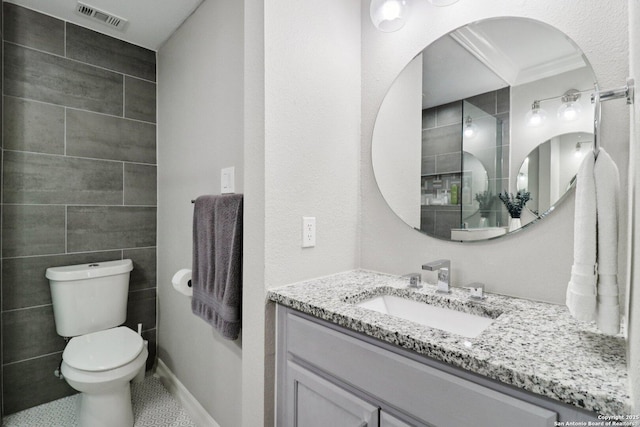 1710 Searcy, San Antonio, TX 78232 - bathroom with vanity, tile walls, and tile patterned floors