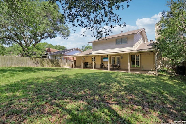 1710 Searcy, San Antonio, TX 78232 - rear view of house featuring a fenced backyard and a patio