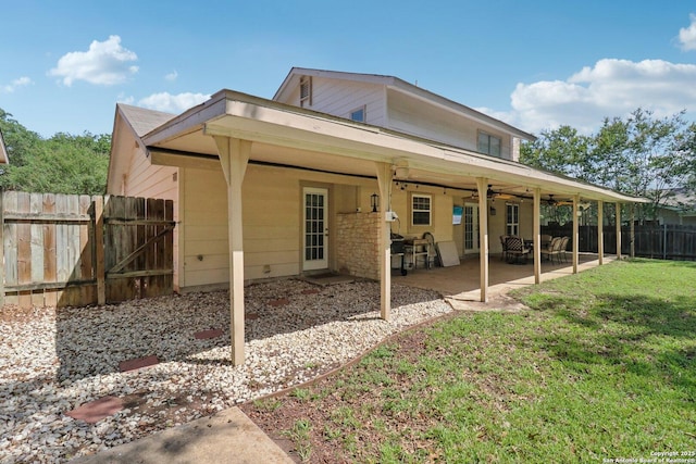 1710 Searcy, San Antonio, TX 78232 - rear view of house with ceiling fan and a patio