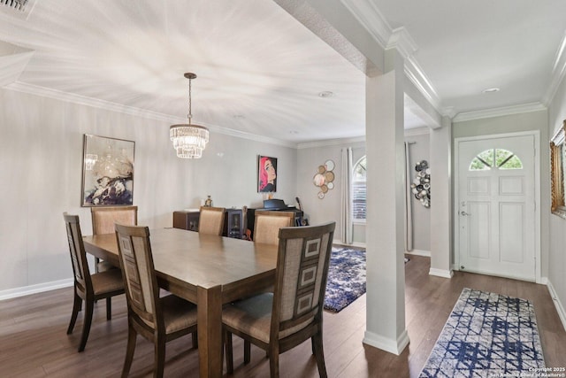 1710 Searcy, San Antonio, TX 78232 - dining room with wood finished floors, a chandelier, crown molding, and ornate columns
