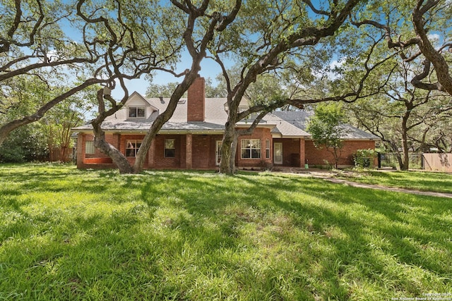 127 Sunflower Ln, San Antonio, TX 78213 - view of front of property featuring a chimney and brick siding