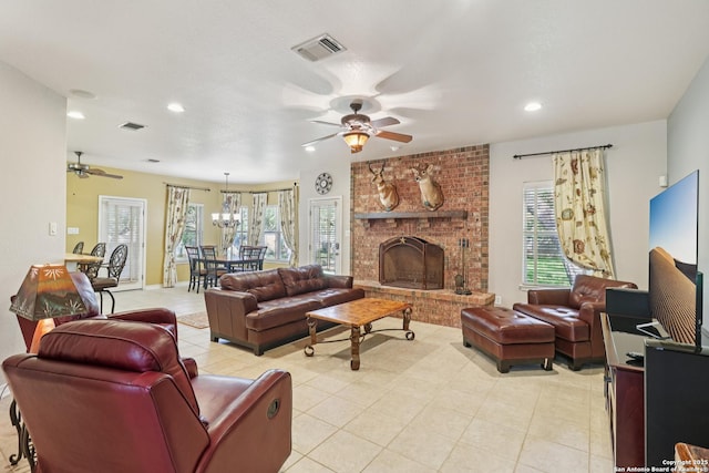 127 Sunflower Ln, San Antonio, TX 78213 - living area with a ceiling fan, light tile patterned floors, recessed lighting, a chandelier, and a brick fireplace