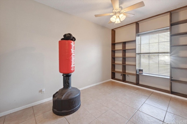 5311 Light House, San Antonio, TX 78242 - spare room with light tile patterned flooring, a ceiling fan, and a textured ceiling