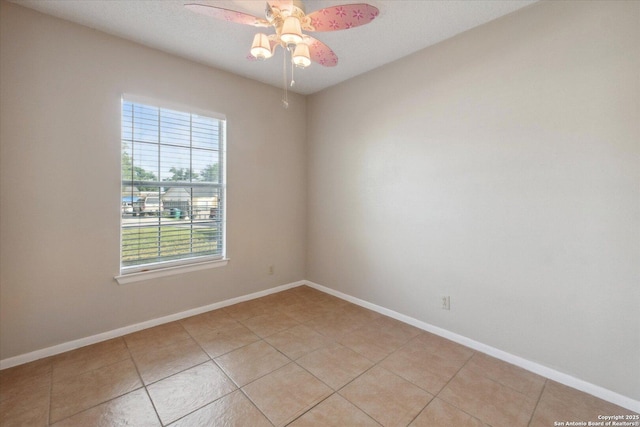 5311 Light House, San Antonio, TX 78242 - spare room with a ceiling fan and light tile patterned floors