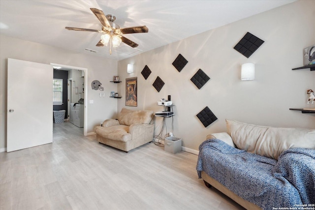 5311 Light House, San Antonio, TX 78242 - living area featuring a ceiling fan and light wood finished floors